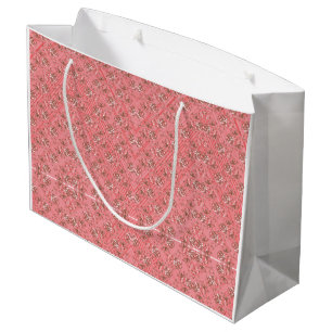 En matta med rött och rosa motiv har en dekorat