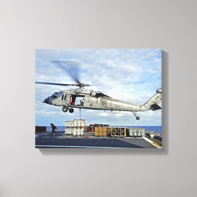 En MH-60S Seahawk förbereds för att leverera ammun Canvastryck (Framsida)