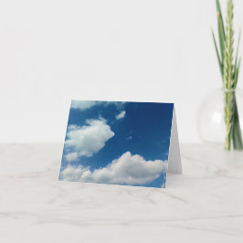 En mjukhet mot molnen tack kort