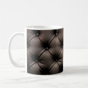 En mörk med läderkudde från ett bilsäte kaffemugg