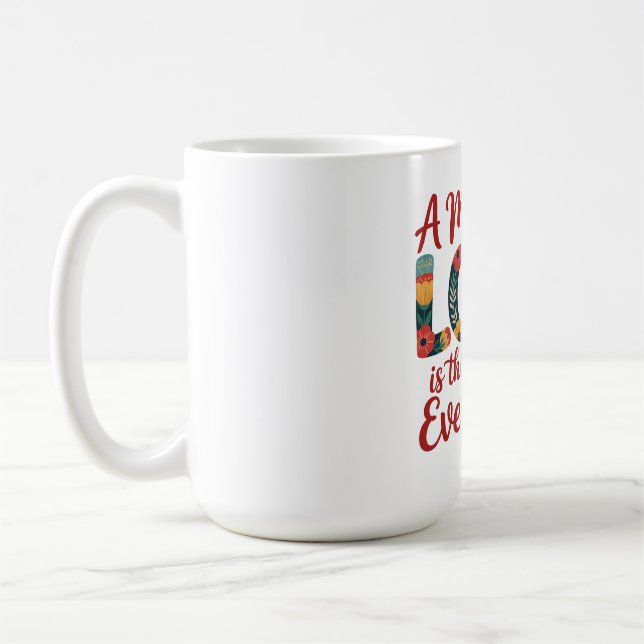 En mors kärlek är svaret på allt kaffemugg (Vänster)