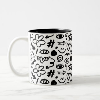 En mugg med en vacker, modern design i svart och v