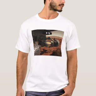En närbild beskådar av armen på NASA fördärva Tee Shirt