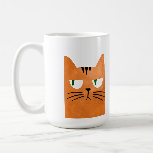 En orange katt med en inställning kaffemugg (Vänster)