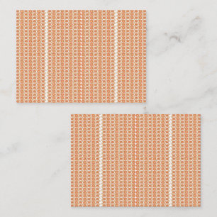 En orange matta med ett texturerat mönster ljuger tidsbeställning kort