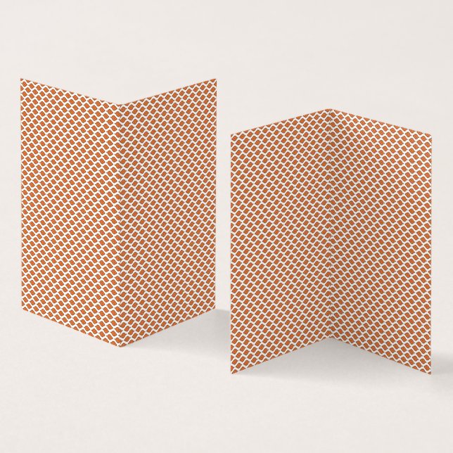 en orange och ett vitt geometriskt mönster kort (In- och utsida)