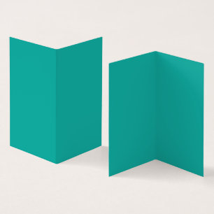 En övertoningsbakgrund som blandar blått i grönt. kort