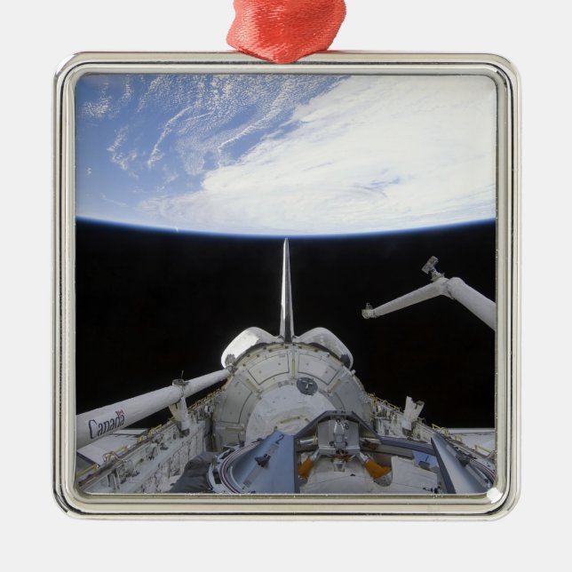 En partiell vy av övergångsnoden julgransprydnad metall (Framsidan)