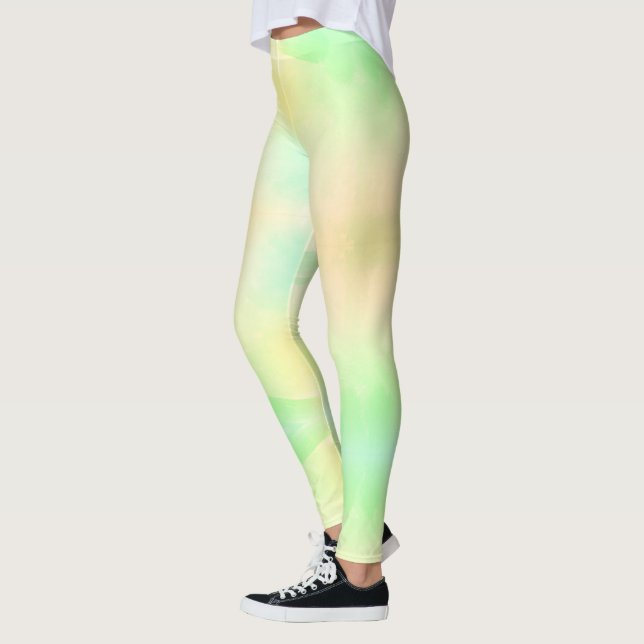 En person bär leggings med en mjuk gradient  (Vänster)