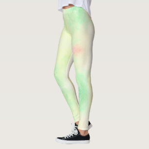 En person som bär pastellgröna leggings med rosa