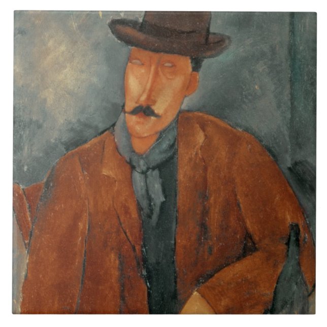 En placerad manbenägenhet på ett bord kakelplatta (Framsidan)