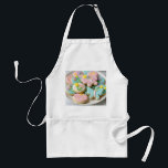 En platta med färgstarka sockerkakor med vår som t förkläde<br><div class="desc">En platta med färgstarka vår-temade sockerkakor,  dekorerade med pastellisering i blommigt och fjärilformer. Kakorna har komplicerade rördetaljer</div>