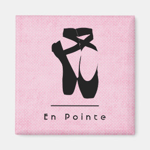 En pointe text med svart bläckfisk en pointe magnet