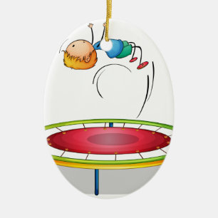 En pojke som leker trampolinen julgransprydnad keramik