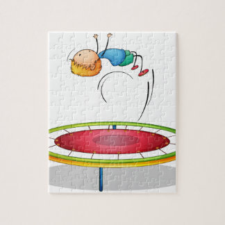 En pojke som leker trampolinen pussel