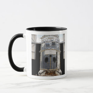 En portion av det Hubble utrymmeteleskop Mugg