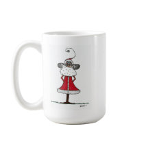 En prim tomten i sin finaste jultomt.