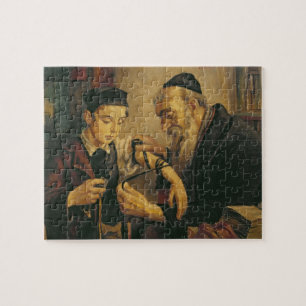 En rabbin som binder phylacteriesna till armen av pussel