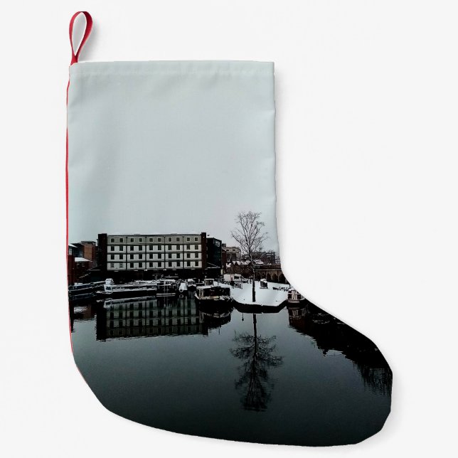 En reflektion i vatten liten julstrumpa (Framsidan)