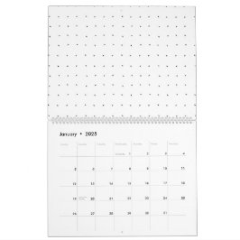 En ren vit bakgrund med små prickar utspridda kalender