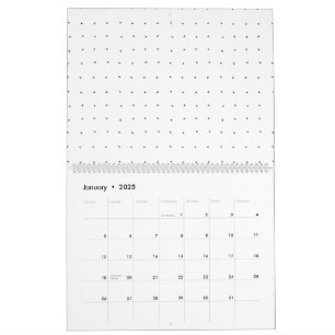 En ren vit bakgrund med små prickar utspridda kalender