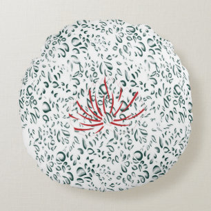 en röd blomma på en svart bakgrund rund kudde