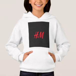 en röd h och m-logotyp på svart bakgrund t shirt