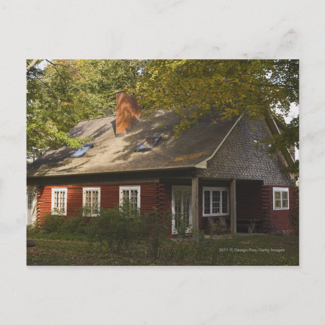 En röd logg hemma vykort (Framsida)