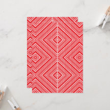 en röd och vit bakgrund med diamant mönster