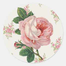 En ros för en vintage rosa blommönster runt klistermärke