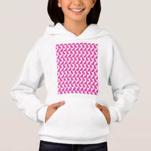 en rosa och vit bakgrund med ett mönster t shirt