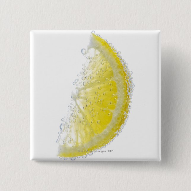 En saftig mogen organisk citronkilfrukt doppade knapp (Framsida)