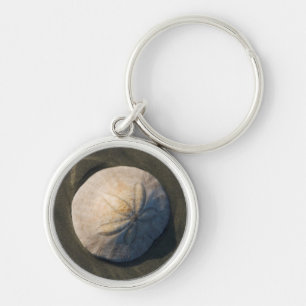 En Sanddollar på stranden Rund Silverfärgad Nyckelring