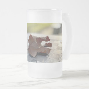 En schack-lektion frostat ölglas