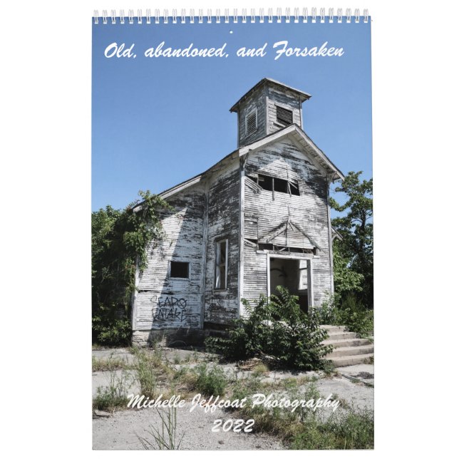 En sida 12-månaders kalender, gammal och övergiven kalender (Omslag)