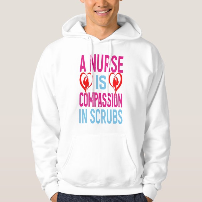 En sjuksköterska är kompassion i krubbar hoodie (Framsida)