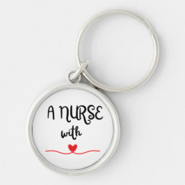 En sjuksköterska med hjärtcirkel rund silverfärgad nyckelring