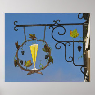 En smideskylt som illustrerar temat poster
