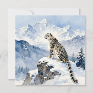 En snöleopard på snötäckt topp kort
