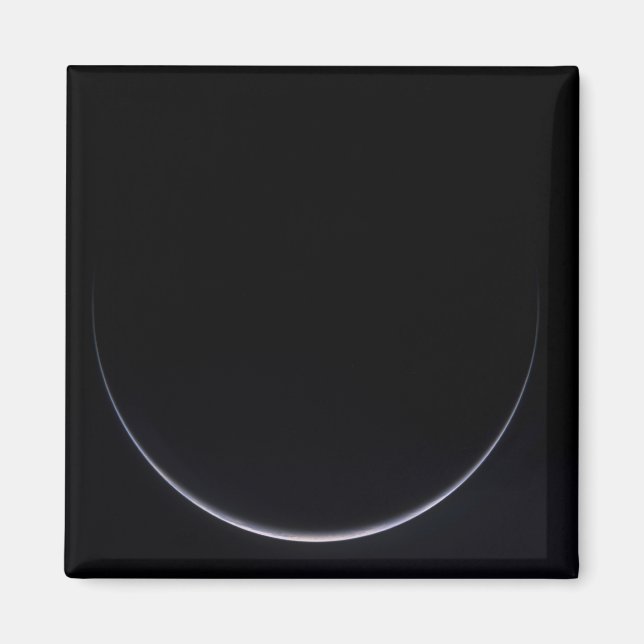 En sol-belyst kresole av jord magnet (Framsidan)