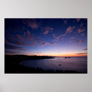En solnedgång över havet i Costa Rica Poster