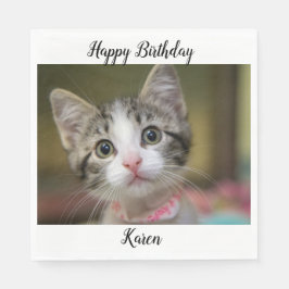 En söt kattunge med grönt öga pappersservett