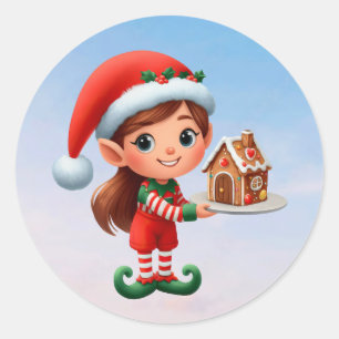 En söt kvinnlig Elf som håller ett gingerbrödhus Runt Klistermärke