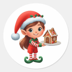 En söt kvinnlig Elf som håller ett gingerbrödhus Runt Klistermärke