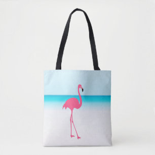 En söt rosa flamingo på stranden tygkasse