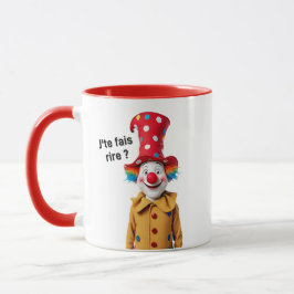 En stor mångfärgad clown med stor röd näsa. mugg