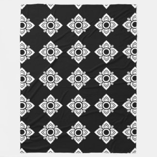 En stor thailändsk Mönster-rankett för alla. Fleecefilt