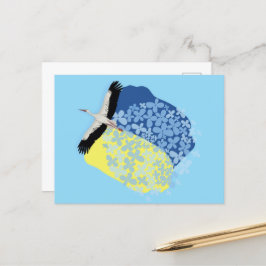 En Stork bär en ukrainsk flagga Vykort