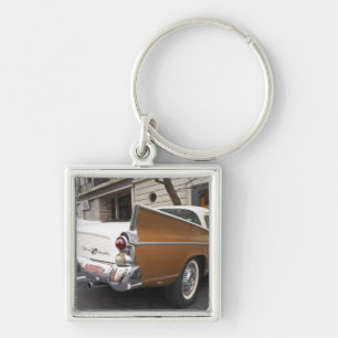 En Studebaker Silver Hawk klassisk bil parkerad på Fyrkantig Silverfärgad Nyckelring