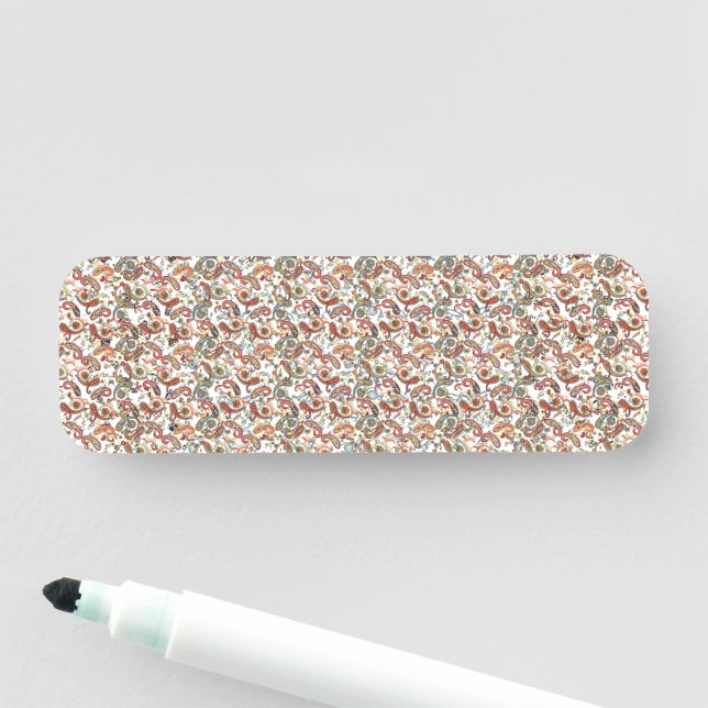 en svart bakgrund med rött, grönt och blått patt namnbricka (På plats)